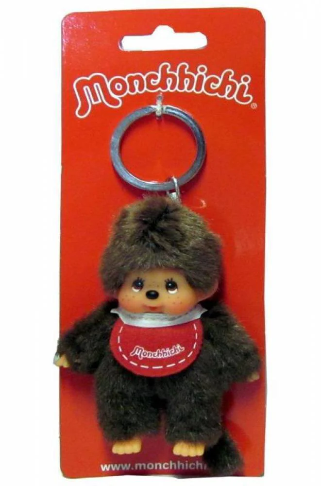 Sekiguchi 2534 - Original Monchhichi Mädchen oder Junge als Schlüsselanhänger, Plüschfigur mit Lätzchen, ca. 10 cm großer Anhänger aus braunem Plüsch für Rucksäcke, Taschen und Federmappen - Image 3